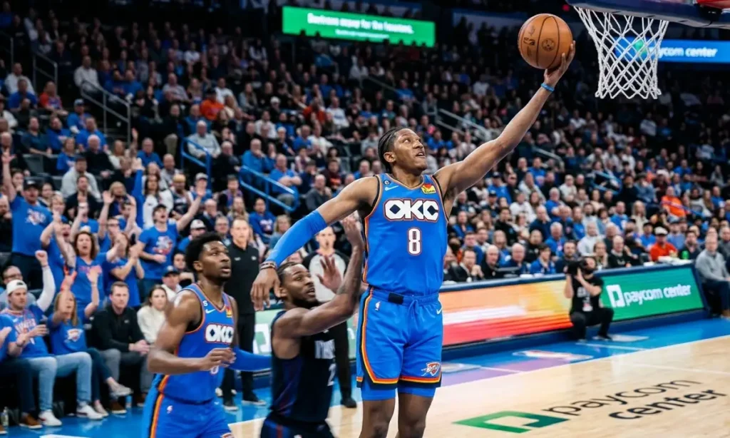 Jalen Williams (JDub) driving to the basket during his historic 2025 NBA Finals performance.